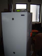 Freezer exterior with control box on top and actuator on right side