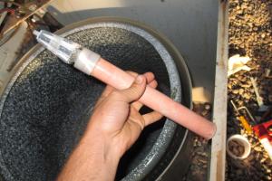 the pink part of the agitator shaft was attached to the spinning drum, and the grey part on the top drives the plastic agitator.