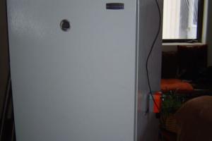 Freezer exterior with control box on top and actuator on right side