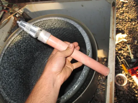 the pink part of the agitator shaft was attached to the spinning drum, and the grey part on the top drives the plastic agitator.